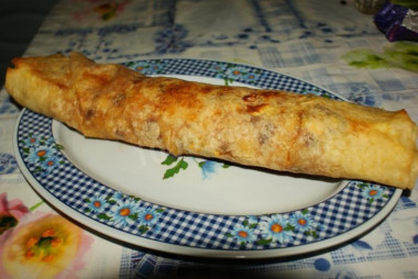 Lazy pita bread strudel with jam and apples