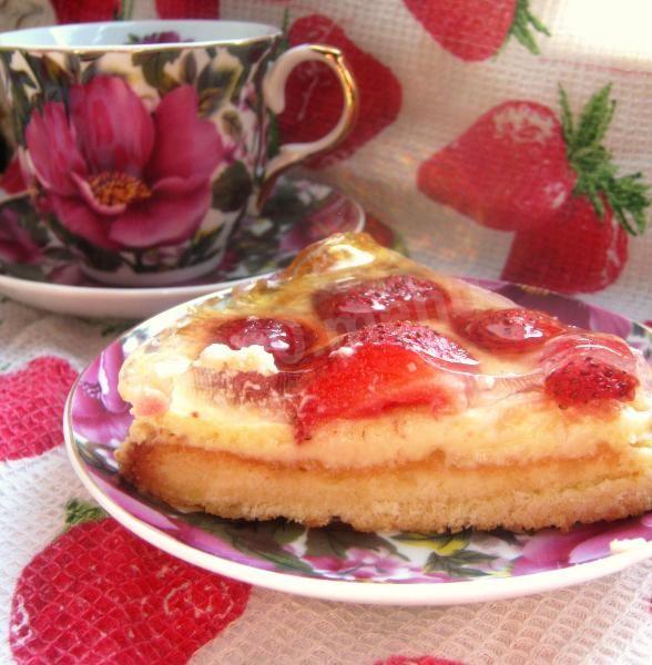 Sponge cake with jelly, strawberries and cheese cream