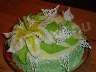 Caprice cake with poppy seeds and nuts with flowers