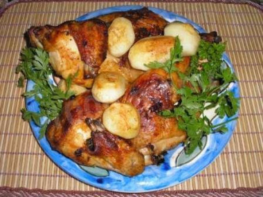 Baked meat in a sleeve with mayonnaise, potatoes and onions