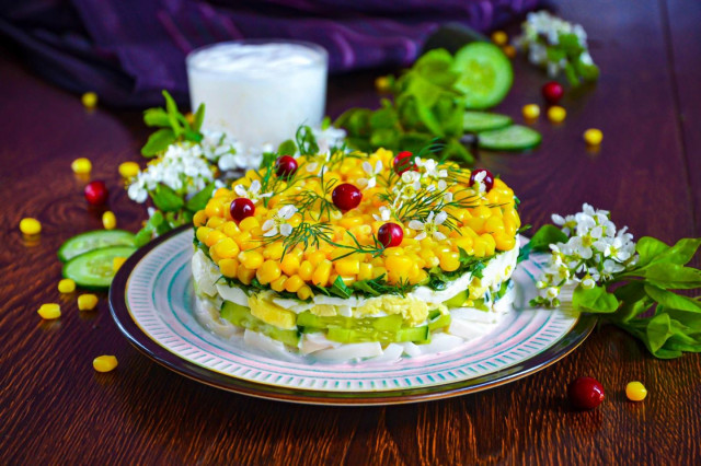 Squid salad with egg and cucumber with corn