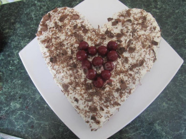 Cherry cake with sour cream and chocolate sprinkles