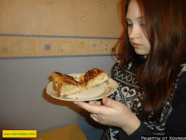 Pita bread khachapuri in a pan with cheese, kefir and egg