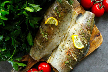 Steamed fish in a steamer