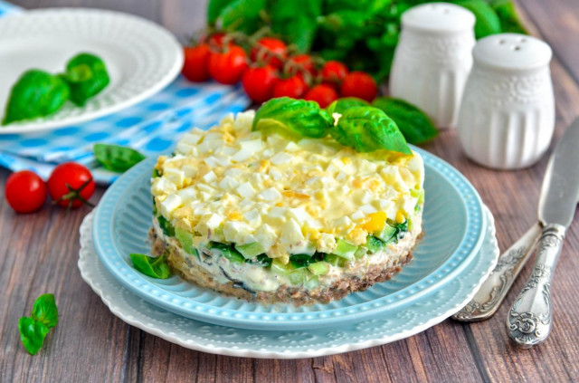 Canned mackerel salad with egg and cucumber