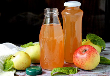 Apple juice in a juicer for winter