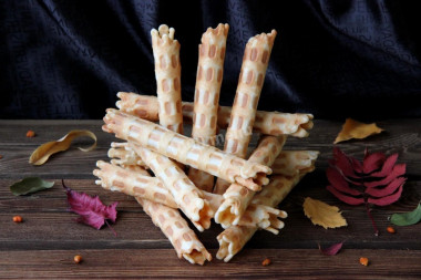 Margarine waffles crispy in a waffle iron