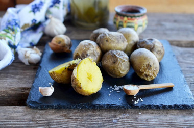 Potatoes in a uniform in the microwave