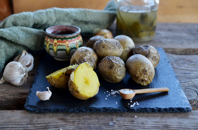 Potatoes in a uniform in the microwave