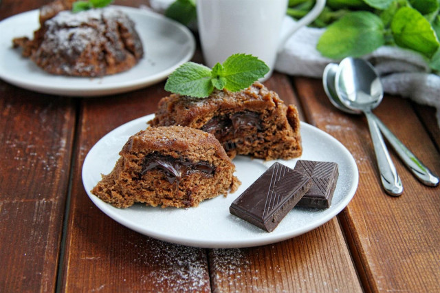 Chocolate cupcake in a mug in the microwave