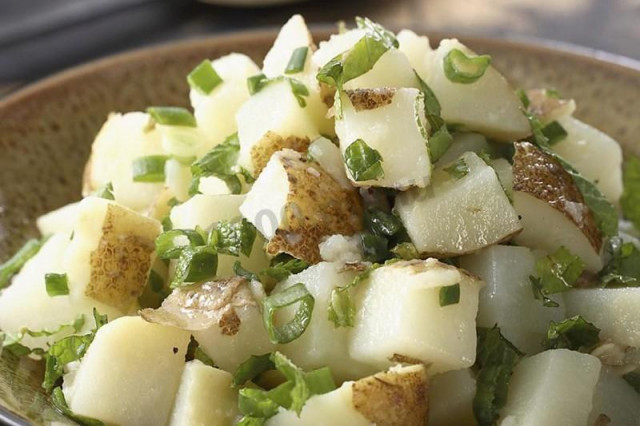 Microwave potatoes with spices and butter in a bag