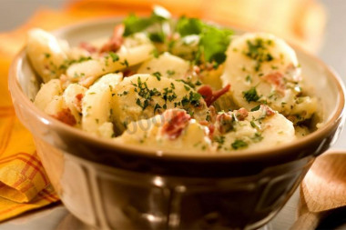 Microwave potatoes with spices and butter in a bag