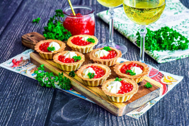 Tartlets with cheese and caviar