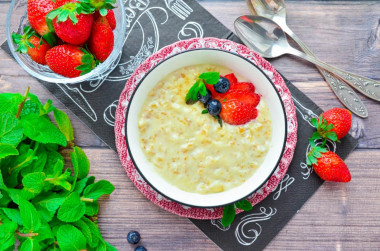 Oatmeal porridge in a slow cooker with milk