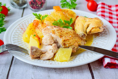 Stewed chicken with potatoes in a slow cooker