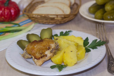 Chicken thighs in a slow cooker with potatoes