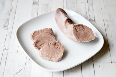 Pork tongue in a slow cooker