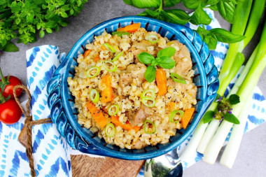 Pearl barley porridge with meat in slow cooker