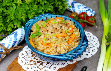 Pearl barley porridge with meat in slow cooker