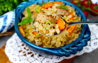 Pearl barley porridge with meat in slow cooker