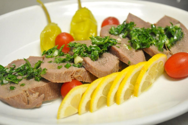 Beef tongue in a slow cooker