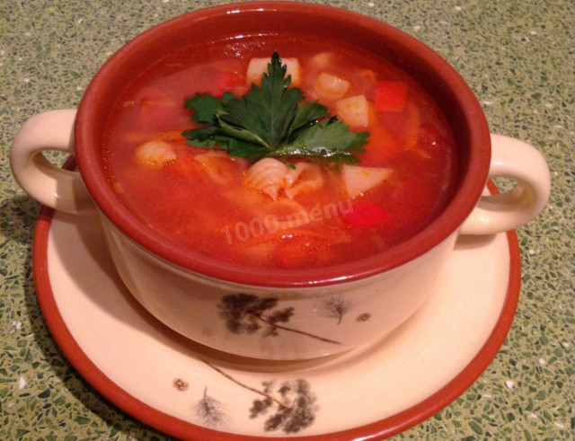 Tomato soup with vegetables and pasta in a slow cooker