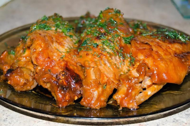 Turkey wings with spicy sauce in a slow cooker