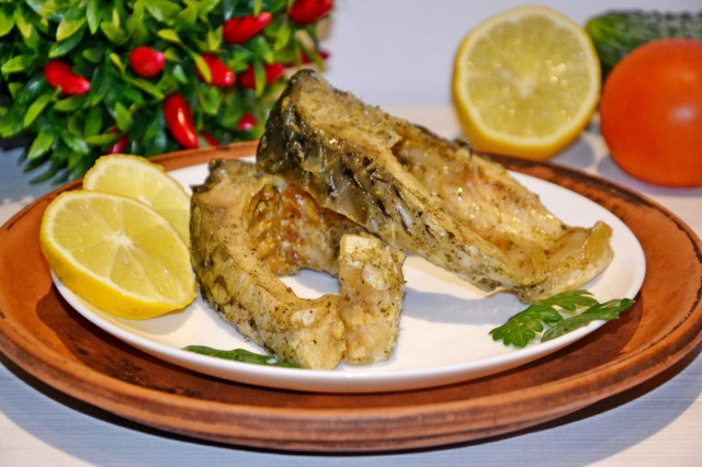 Steamed carp in a steamer