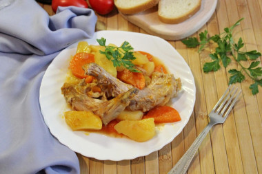 Rabbit in a cauldron stewed with potatoes