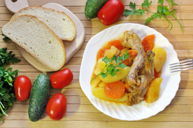 Rabbit in a cauldron stewed with potatoes