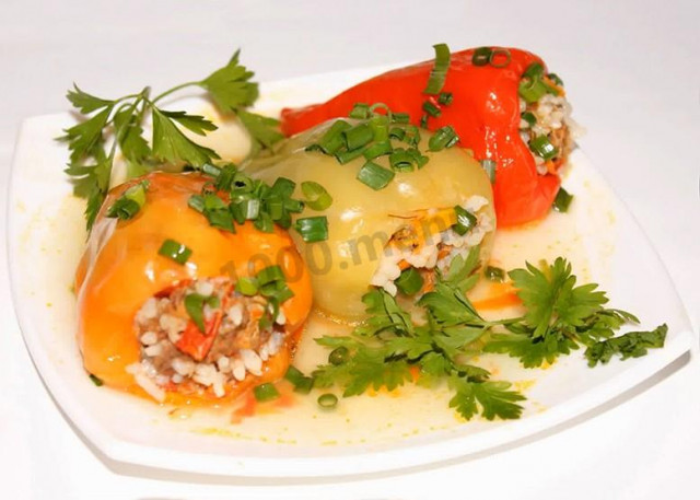 Peppers stuffed with meat with tomato paste in a slow cooker