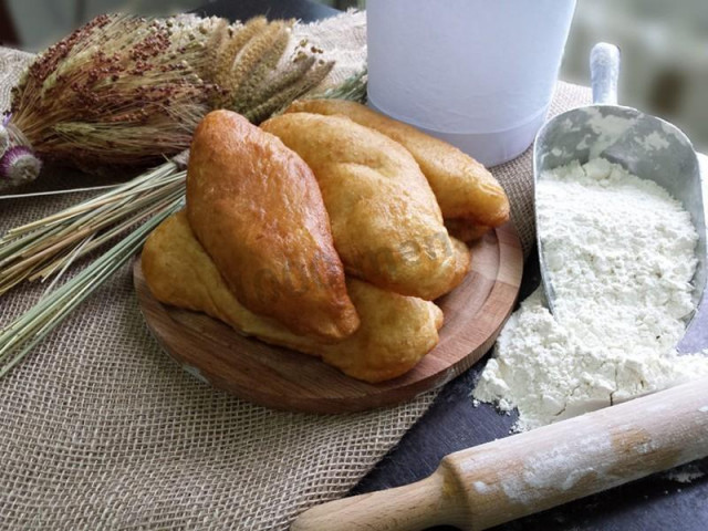 Deep fried pies with minced meat and dill