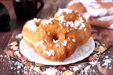 Sweet fried donuts in butter