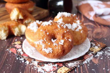 Sweet fried donuts in butter