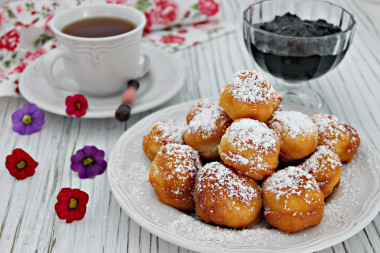 Cottage cheese donuts in butter