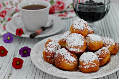 Cottage cheese donuts in butter