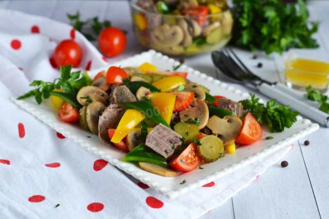 Salad with meat, mushrooms and cucumbers