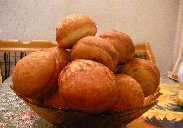 Fluffy round yeast donuts with filling