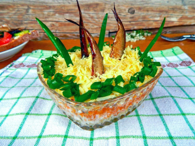 Fish salad in the pond with sprats