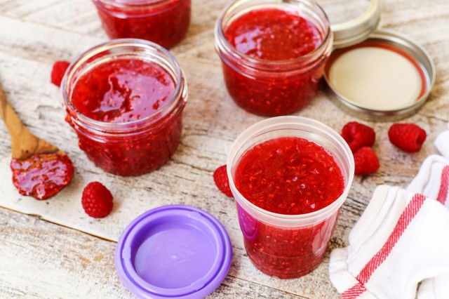 Frozen raspberries with sugar for winter