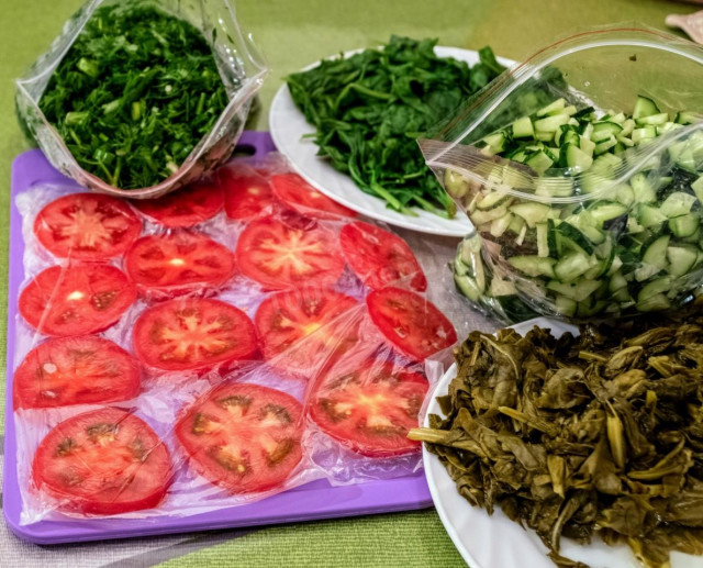 Harvesting and freezing vegetables with herbs for winter