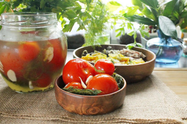 Lightly salted tomatoes with garlic in a jar