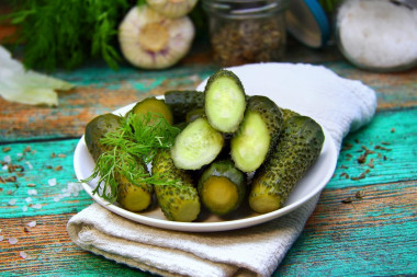 Cucumbers with aspirin for winter in a jar