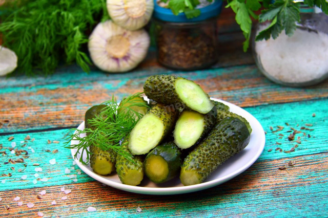 Cucumbers with aspirin for winter in a jar