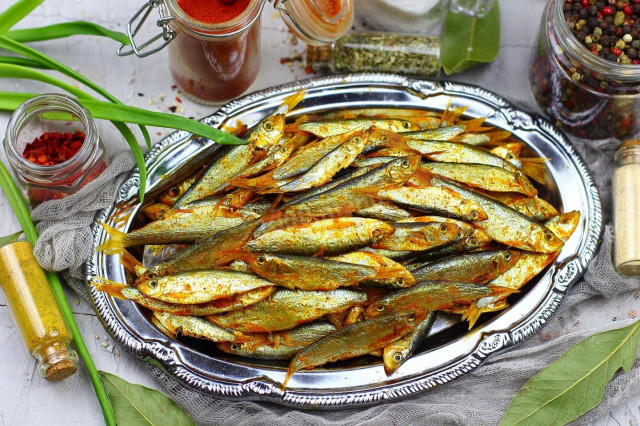 Dried sprat in an electric dryer