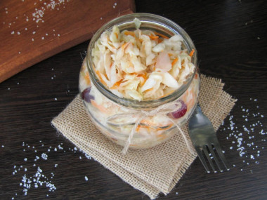 Crispy sauerkraut in a jar for winter