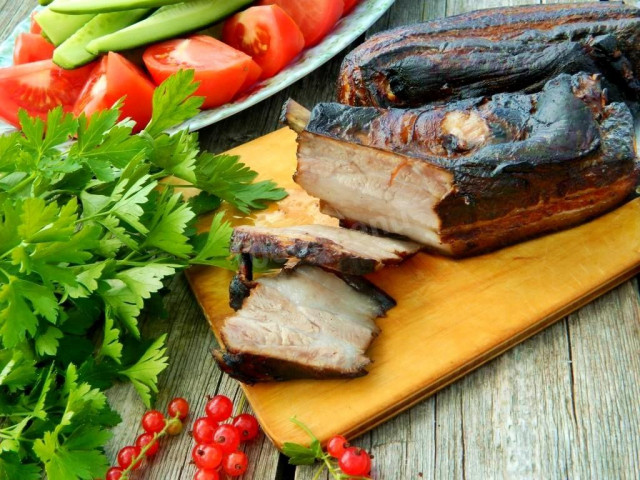 Hot smoked brisket in a smokehouse at home