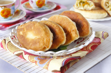 Pies with cabbage on kefir fried in a frying pan