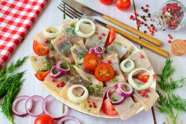 Pickled herring with onion and vinegar