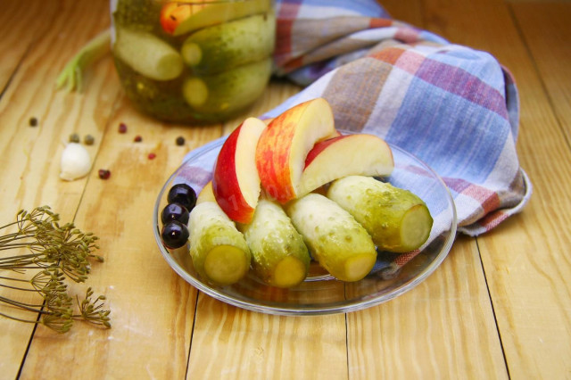 Cucumbers with apples pickled for winter